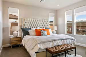 Bedroom featuring carpet flooring and recessed lighting