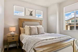 Bedroom featuring baseboards