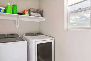 Laundry room with washer and dryer