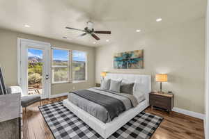 Bedroom with access to exterior, recessed lighting, wood finished floors, a textured ceiling, and a ceiling fan