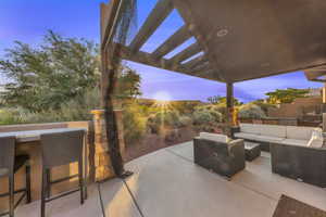 View of patio / terrace with outdoor lounge area and a pergola