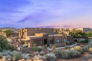 View of front of home featuring stucco siding