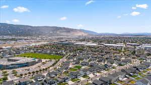 Aerial view of residential area with a mountainous background