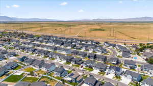 View of property location featuring a mountainous background and nearby suburban area