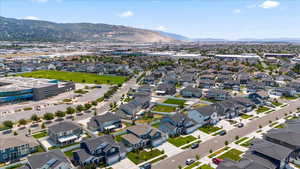 Aerial view of residential area with a mountain backdrop