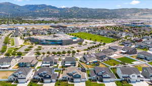 Aerial view of residential area with a mountainous background