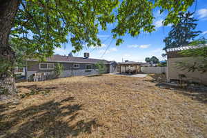 View of yard featuring a patio area and a gazebo