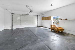 Garage featuring a garage door opener