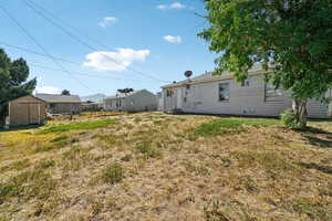 View of yard featuring a storage shed