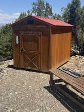 10x12 Shed Left of Awning