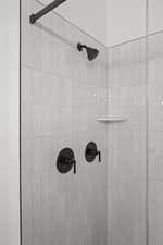 Bathroom view of a tile shower