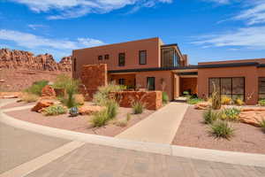 View of front of property with stucco siding