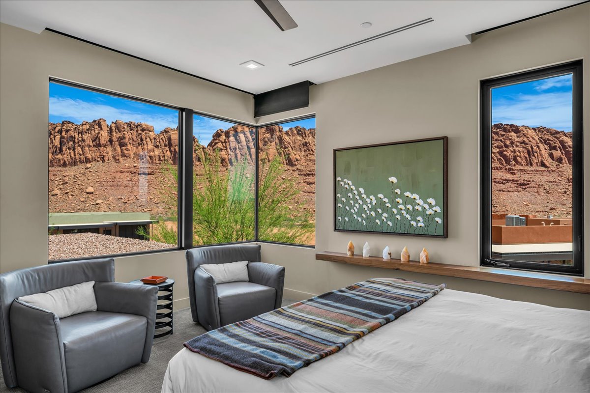 Bedroom with carpet and a ceiling fan
