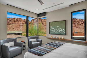 Bedroom with carpet and a ceiling fan