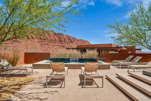 View of swimming pool featuring a patio area and a swimming pool