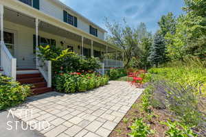 Covered porch with a patio