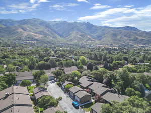 Aerial view of residential area featuring a mountain backdrop