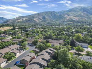 Aerial perspective of suburban area featuring mountains