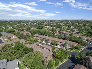 Aerial view of property's location featuring nearby suburban area