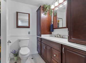Attached Primary half bathroom with walk-in closet.