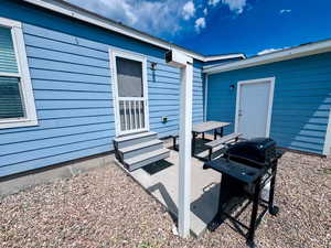 View of patio / terrace with entry steps and grilling area