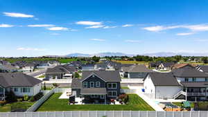 Aerial view of residential area with a mountainous background