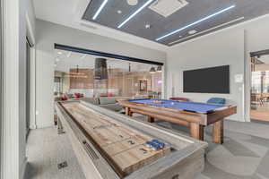 Recreation room with pool table and baseboards