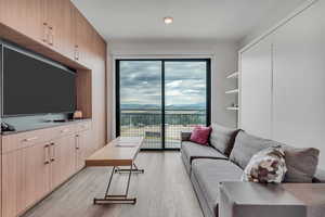 Living area with light wood-style floors