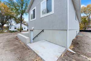 View of property exterior with stucco siding