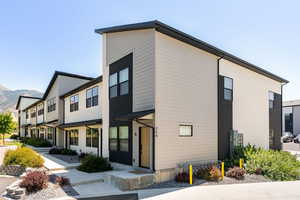 View of front of property with a mountain view