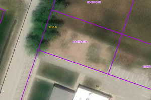 Aerial view of property's location with property parcel outlined