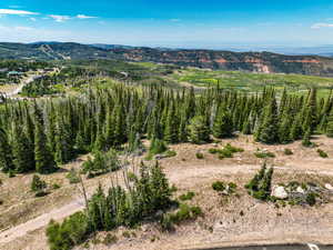 Aerial overview of property's location featuring mountains