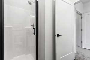 Bathroom featuring a stall shower
