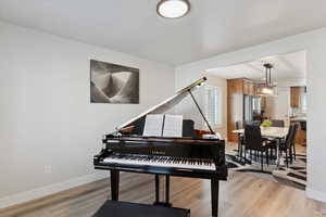Sitting room featuring light wood-type flooring