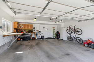 Garage with freestanding refrigerator