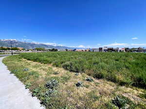 View of mountain backdrop featuring rural landscape
