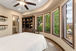 Bedroom featuring recessed lighting, ensuite bath, carpet floors, and ceiling fan