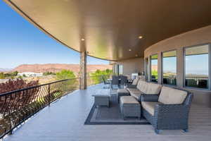 View of patio / terrace featuring an outdoor living space and a mountain view