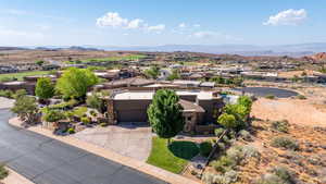 Aerial view of residential area featuring a mountain backdrop