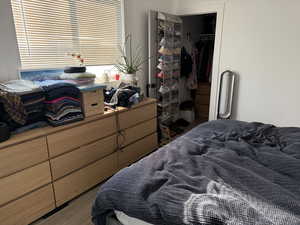Bedroom with wood finished floors
