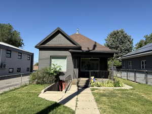 Back of property with a fenced backyard