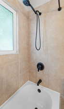 Full bathroom featuring shower / tub combination