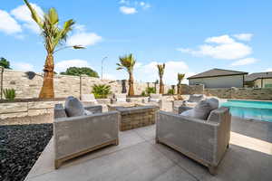 Fenced backyard featuring outdoor lounge area and a patio area