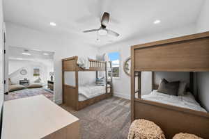 Carpeted bedroom featuring recessed lighting and ceiling fan