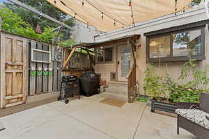 View of patio / terrace featuring entry steps and grilling area