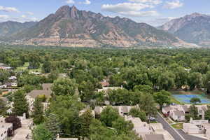 View of mountain background featuring nearby suburban area