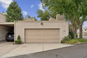 View of front of home with stucco siding