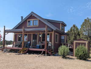 View of front of house with covered porch