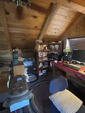 Office area featuring wood ceiling