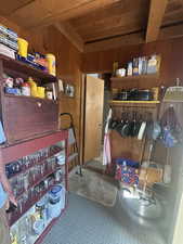 Misc room with wooden walls